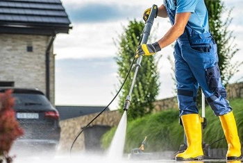 About People Helping People pressure washing driveway surface