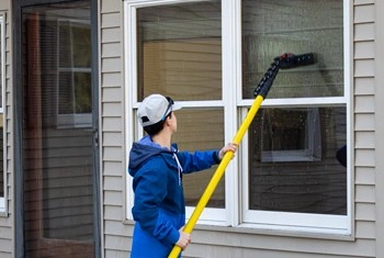 About People Helping People exterior window washing with extension pole