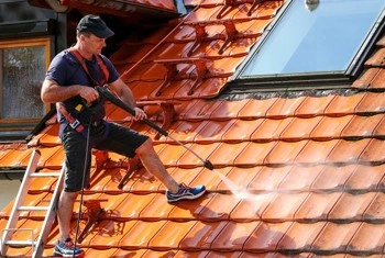 About People Helping People roof cleaning and shingle washing service