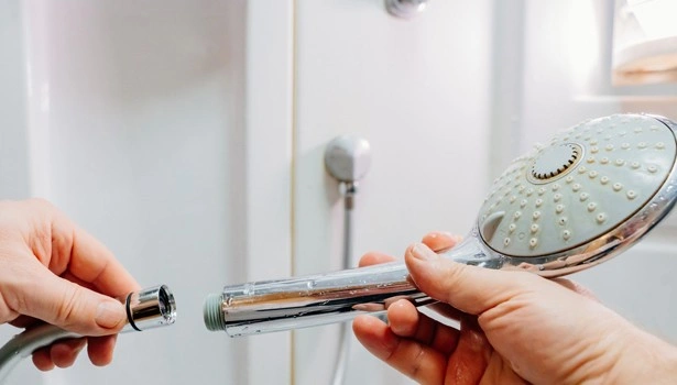 About People Helping People shower head repair in bathroom